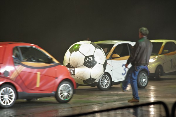 Jeremy Clarkson in a Top Gear Live stage show amongst a game of �Car Soccer�